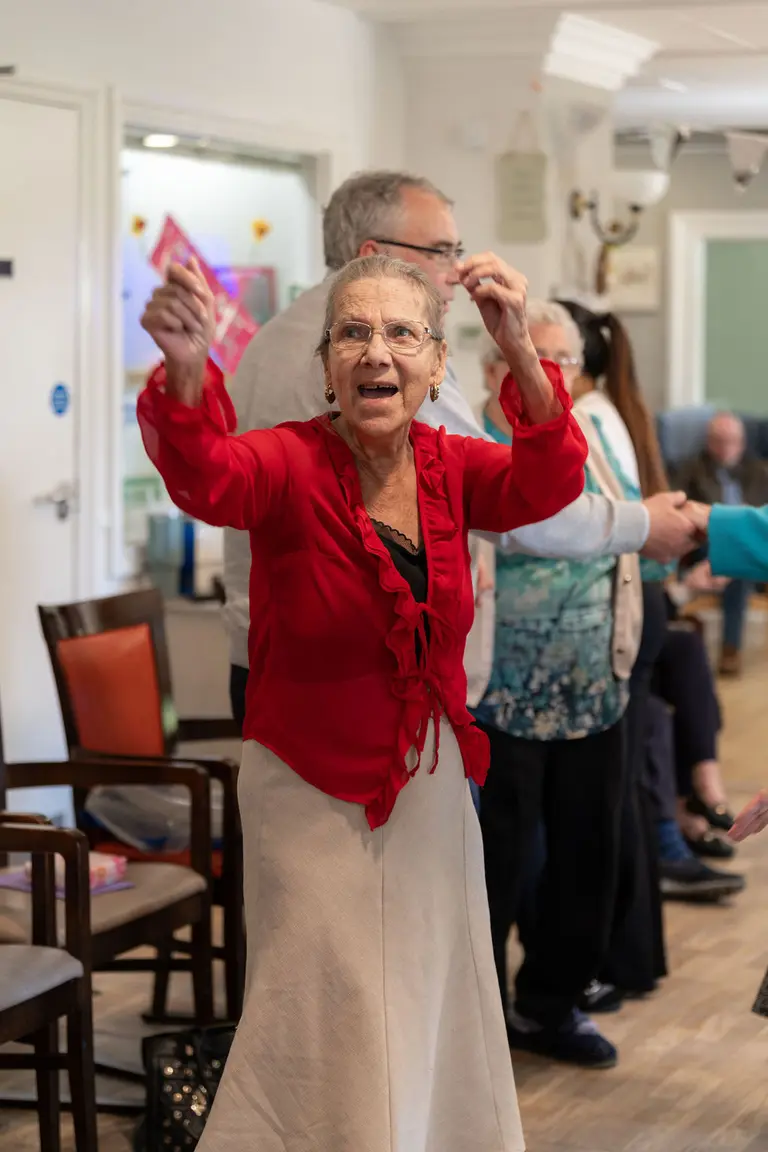 A resident in the lounge at Aria Care Home