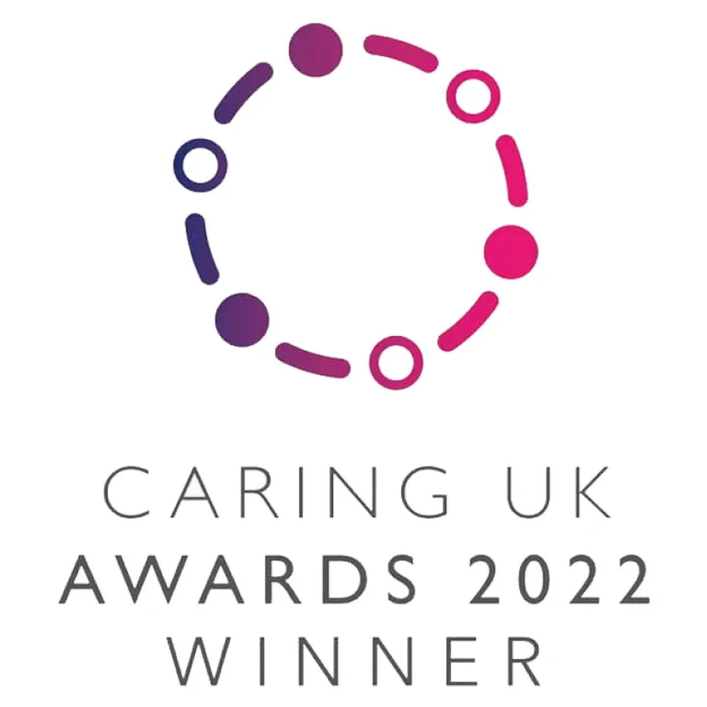 The Caring UK Awards 2022 winner's badge.