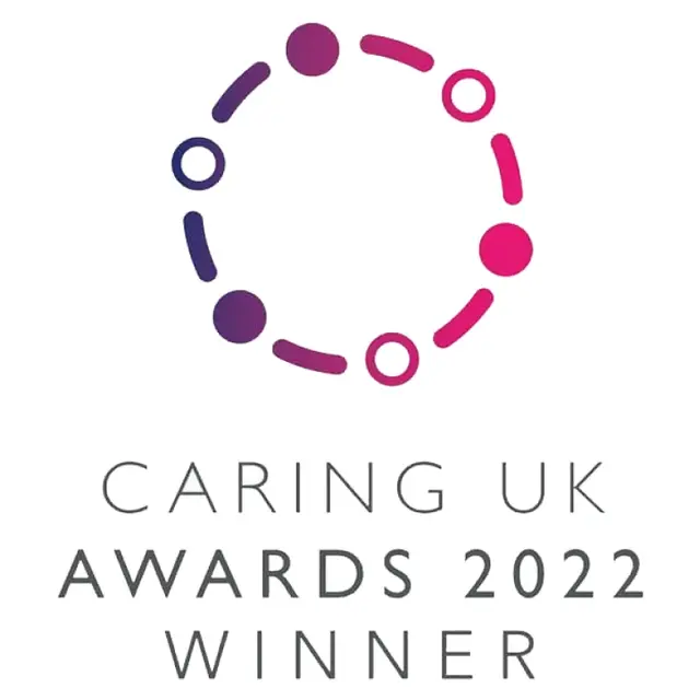 The Caring UK Awards 2022 winner's badge.