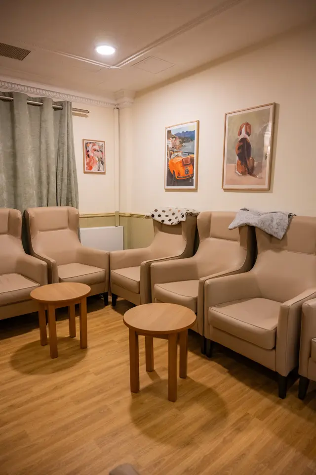 A quiet lounge corner with armchairs and a small table