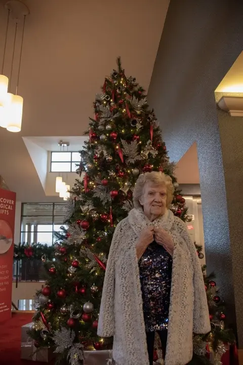 Residents, families and the team celebrating Christmas 2018.