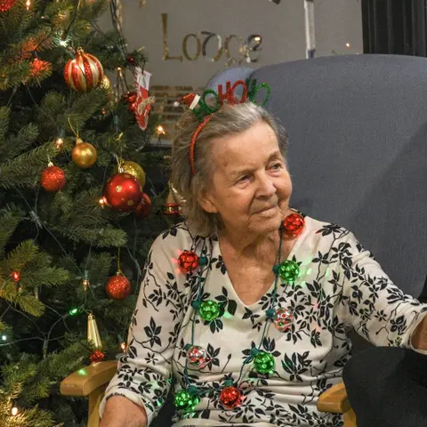 Residents, families and the team celebrating Christmas 2018.